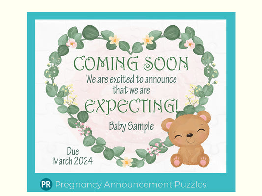 Baby is coming jigsaw puzzle announcement. Gift to give to grandparents or family members. Puzzle has a nature flower and leaves in a heart shape for the background, an adorable baby bear and a custom message about baby's name and when expected to arrive.